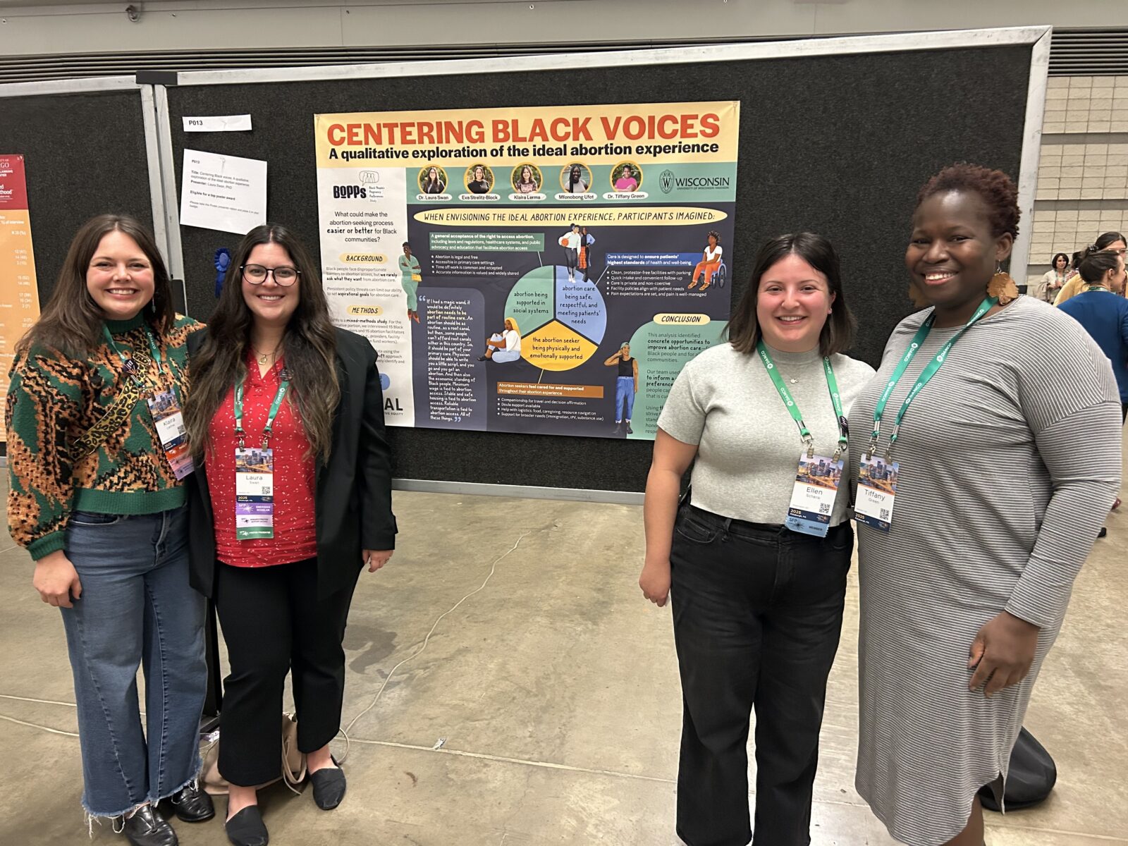 Team pictured with research poster